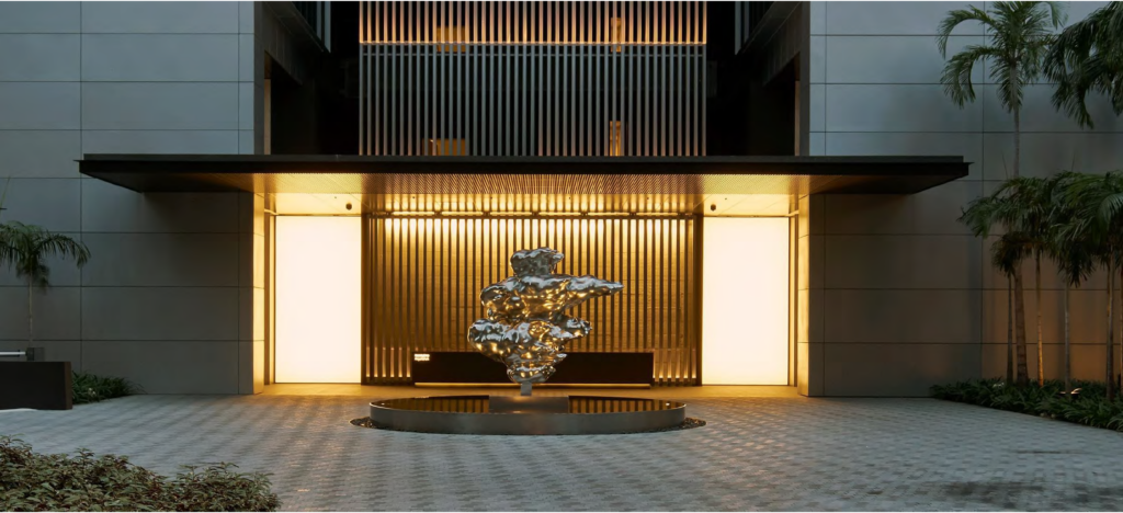 Contemporary luxury building entrance with warm ambient lighting, featuring a central abstract metallic sculpture and a sleek, symmetrical façade.
