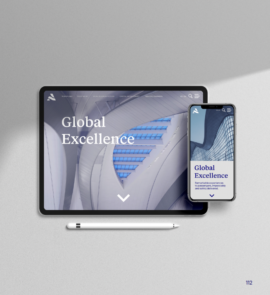 Tablet and smartphone displaying a sleek website interface with the headline “Global Excellence” over a modern architectural background.