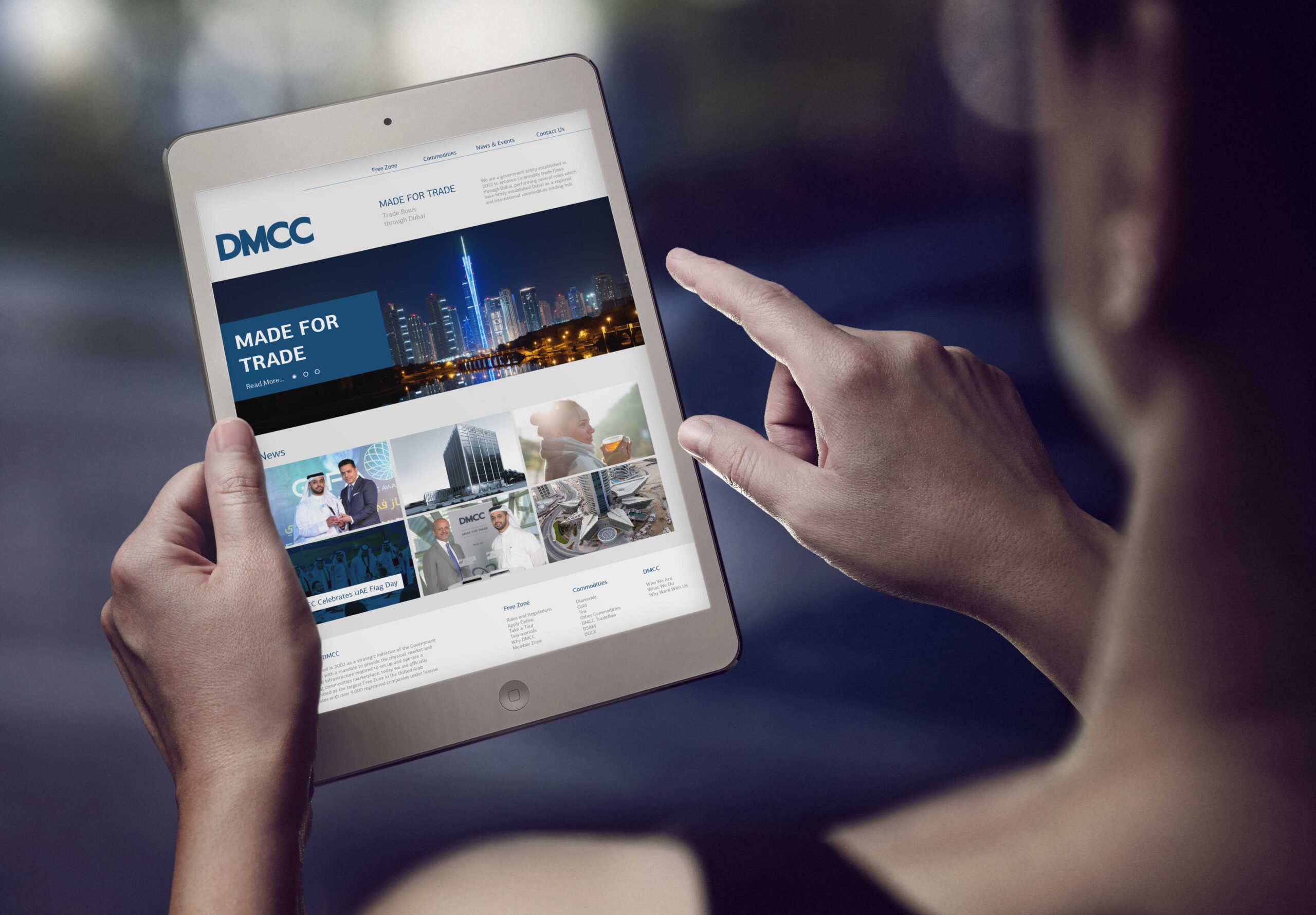 DMCC branded website design on iPad mockup